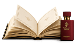 Open book beside an Auralia perfume bottle